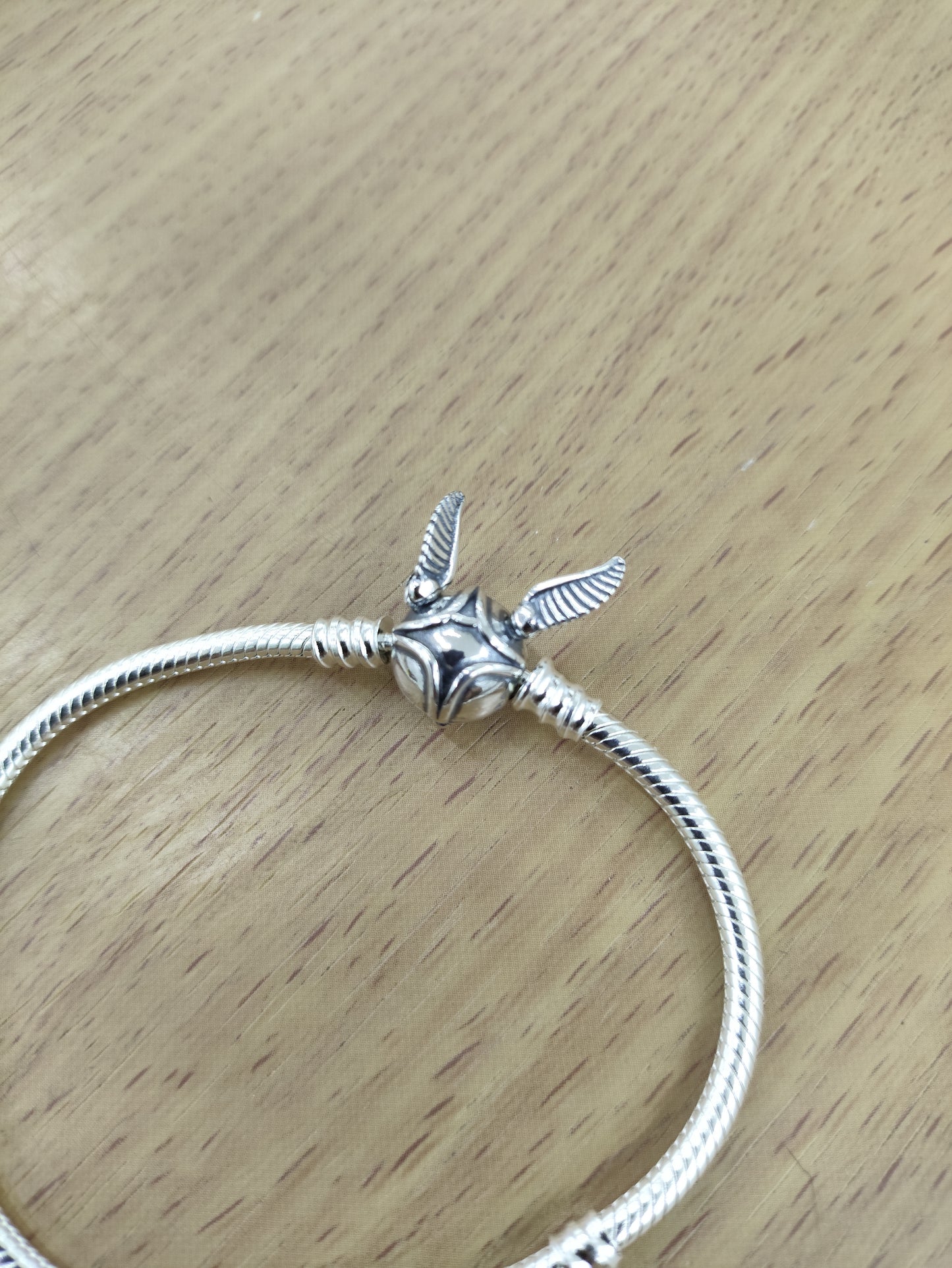 TMPPD014-19 Pulsera Dama Pand Snitch Harry Potter 19 cm en Plata Fina .925