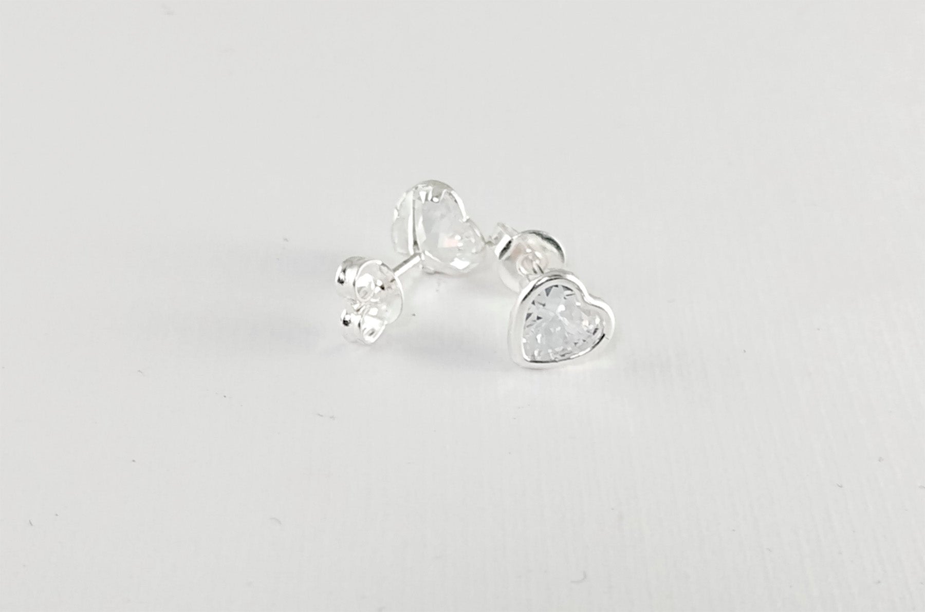 LPAPP006 Arete Broquel Zirc Cora CB 6 mm Pack 4 Pzas Mayoreo Plata .925 1460265534